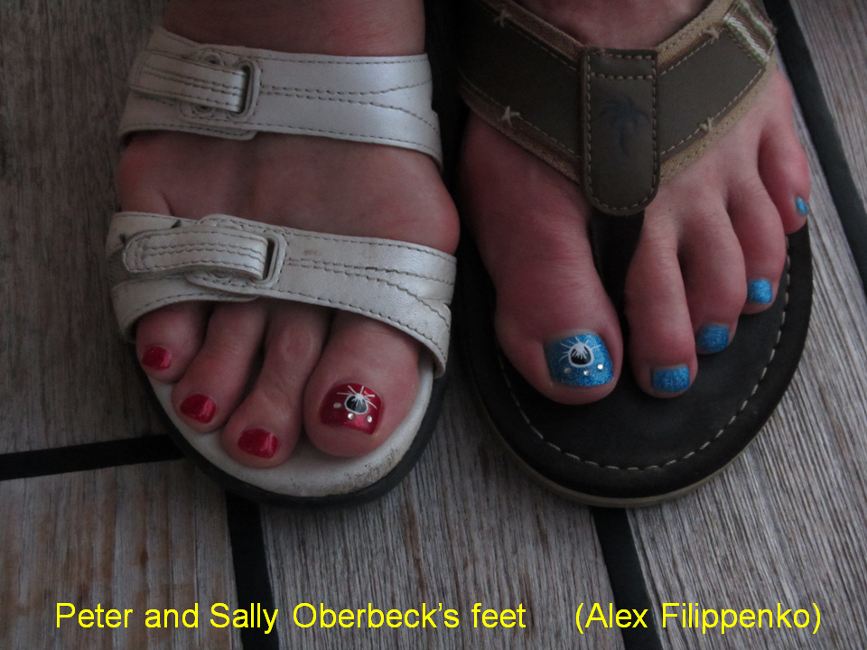 toenails painted with eclipses & diamonds representing diamond rings